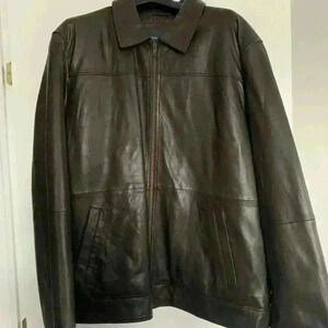 Logan Hill genuine NWOT leather jacket. Buttery soft leather. Ptp 24”height 30”
